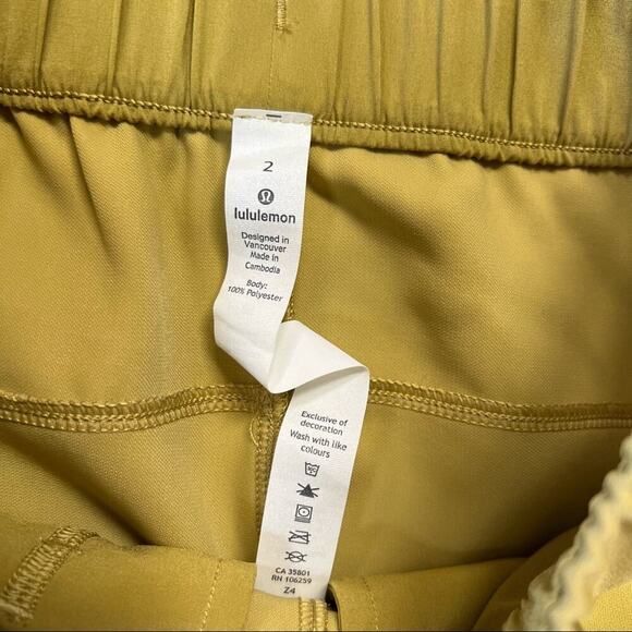 Lululemon On the Fly Crop *Woven 23" Vintage Gold SZ 2 - Picture 6 of 7
